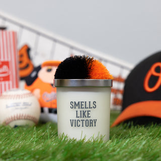 Victory - Black & Orange 5.5 oz - 100% Soy Wax Candle with Pom Pom Lid
Scent: Tranquility